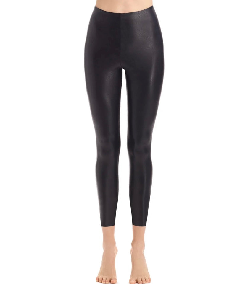 Commando 7/8 length faux leather leggings with tummy control waistband for smoothing effect.