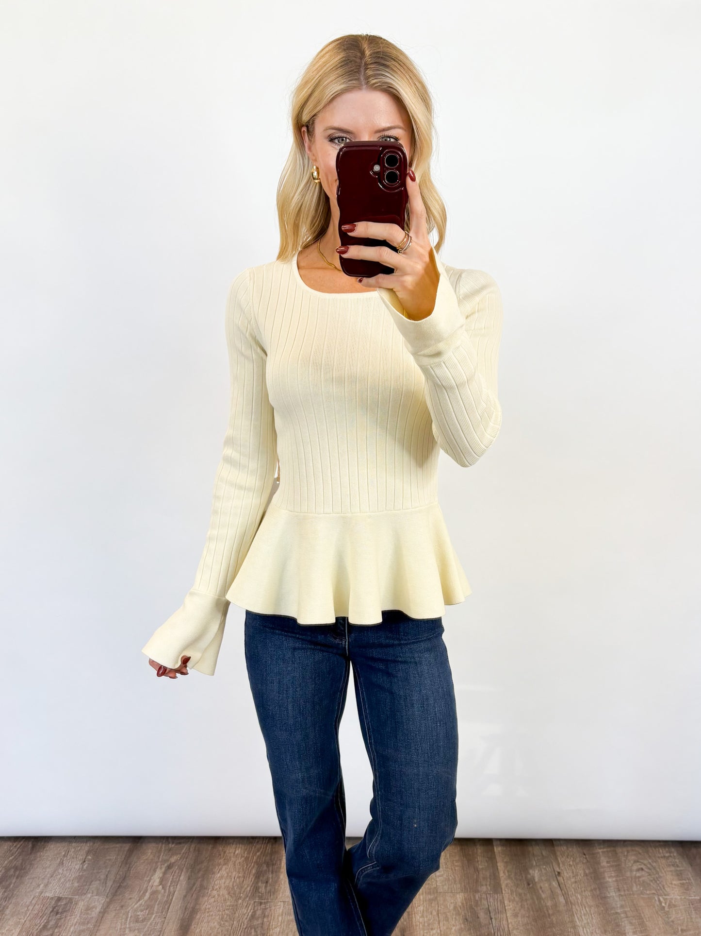 Ivory Belle Peplum Sweater